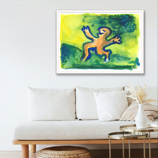 A framed abstract painting featuring a stylized orange figure on a vibrant green and yellow background, displayed on a white wall above a modern white sofa in a minimalist living room setting.