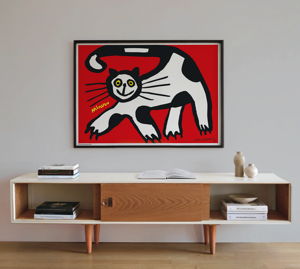 Poster with an expressive, naive illustration of a cosy, happy black-and-white cat against a red background